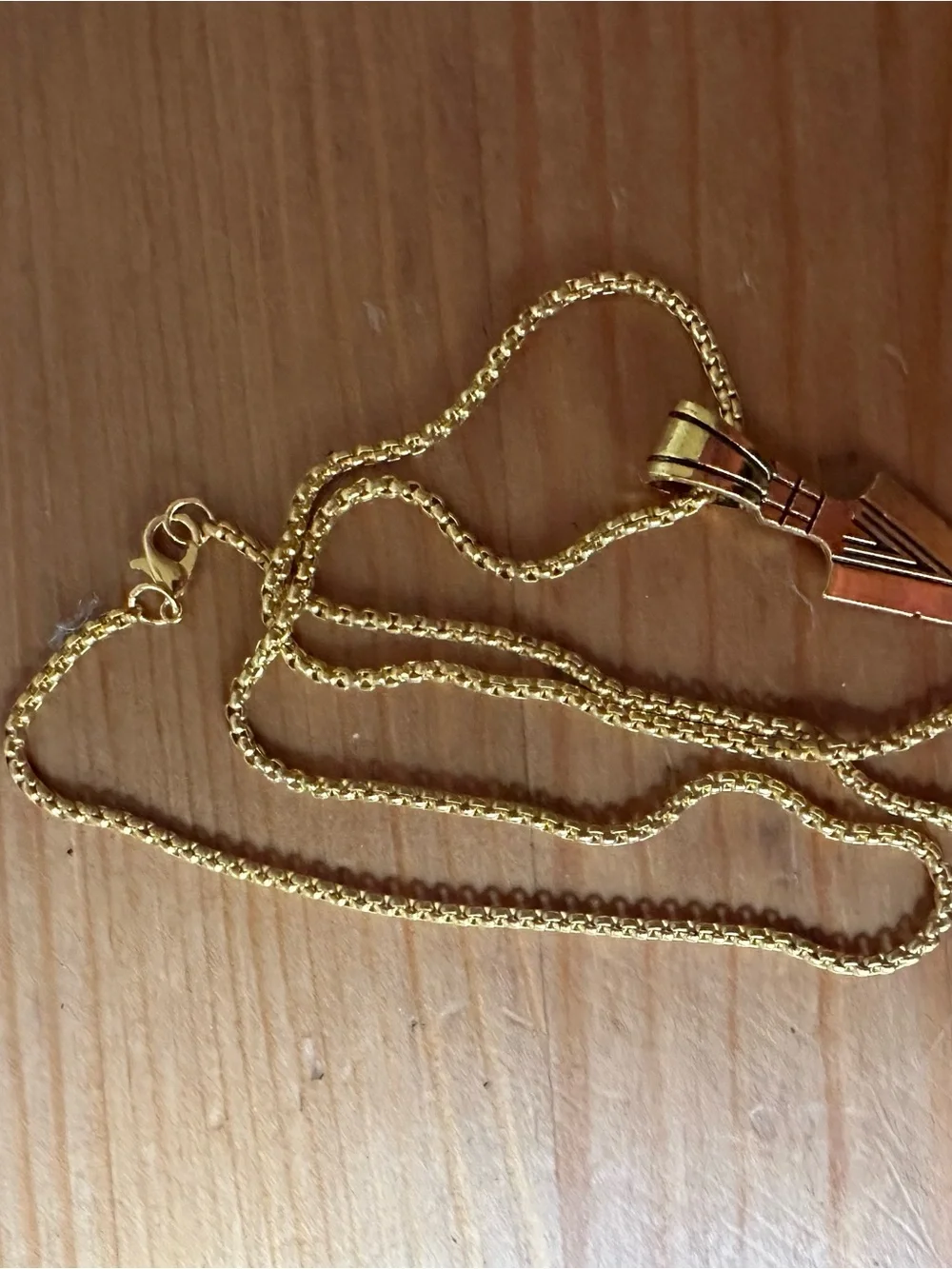 Gold tone Arrow Pendant Necklace